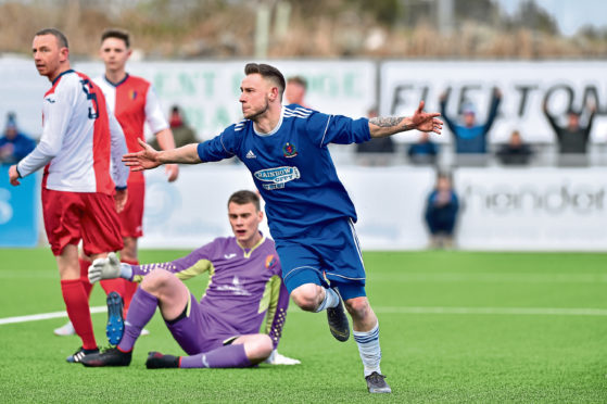 Cove 9 Mitchel Meggison opening the scoring and celebrating. Picture by Scott Baxter