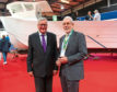 Fisheries Secretary Fergus Ewing (L) and Scottish Fishermen's Federation chief executive Bertie Armstrong (R).