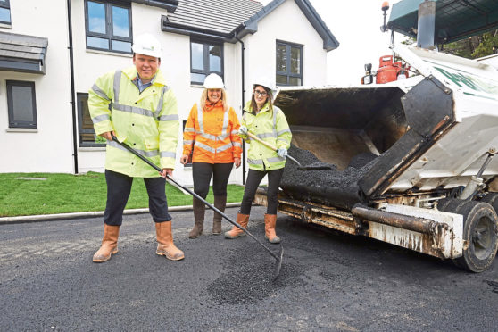 L-R, Dave Main, managing director north (Springfield Properties; Sarah Larkin, contracts manager (MacRebur); Dale Ashelford, events co-ordinator (Springfield)