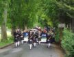 March to raise awareness of mental health issues was led by Northern Constabulary Community Pipe Band. credit Dave Conner