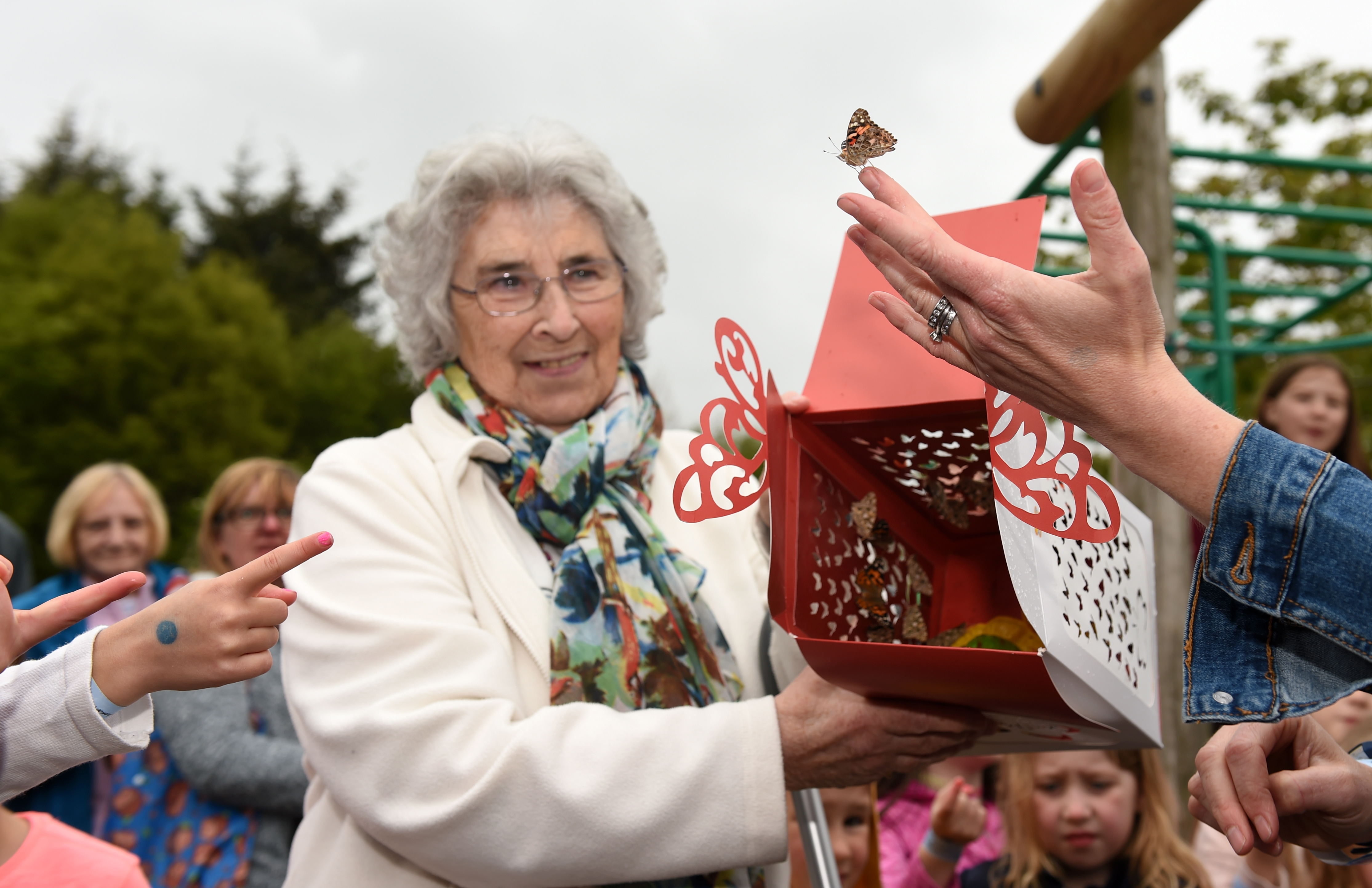 Peggy Paterson, the oldest former pupil in attendance, helped to release the butterflies