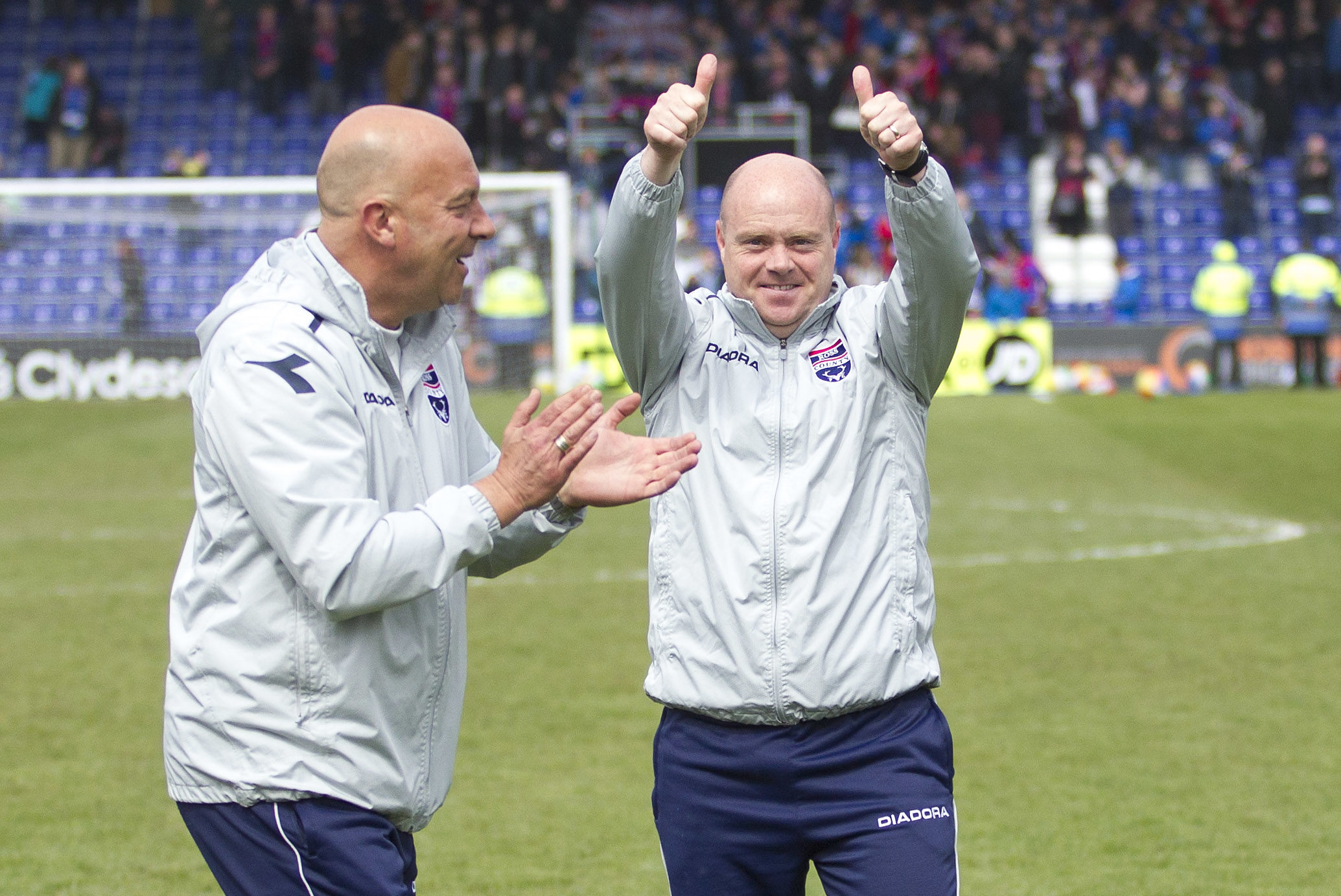 Neale Cooper with Steven Ferguson after a victory over Caley Thistle.