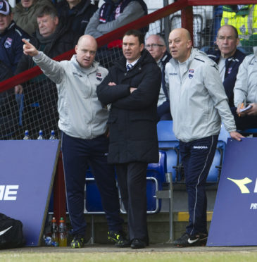 Adams (centre) at County with assistant Neale Cooper (right) and coach Steven Ferguson - who is now Staggies co-boss.