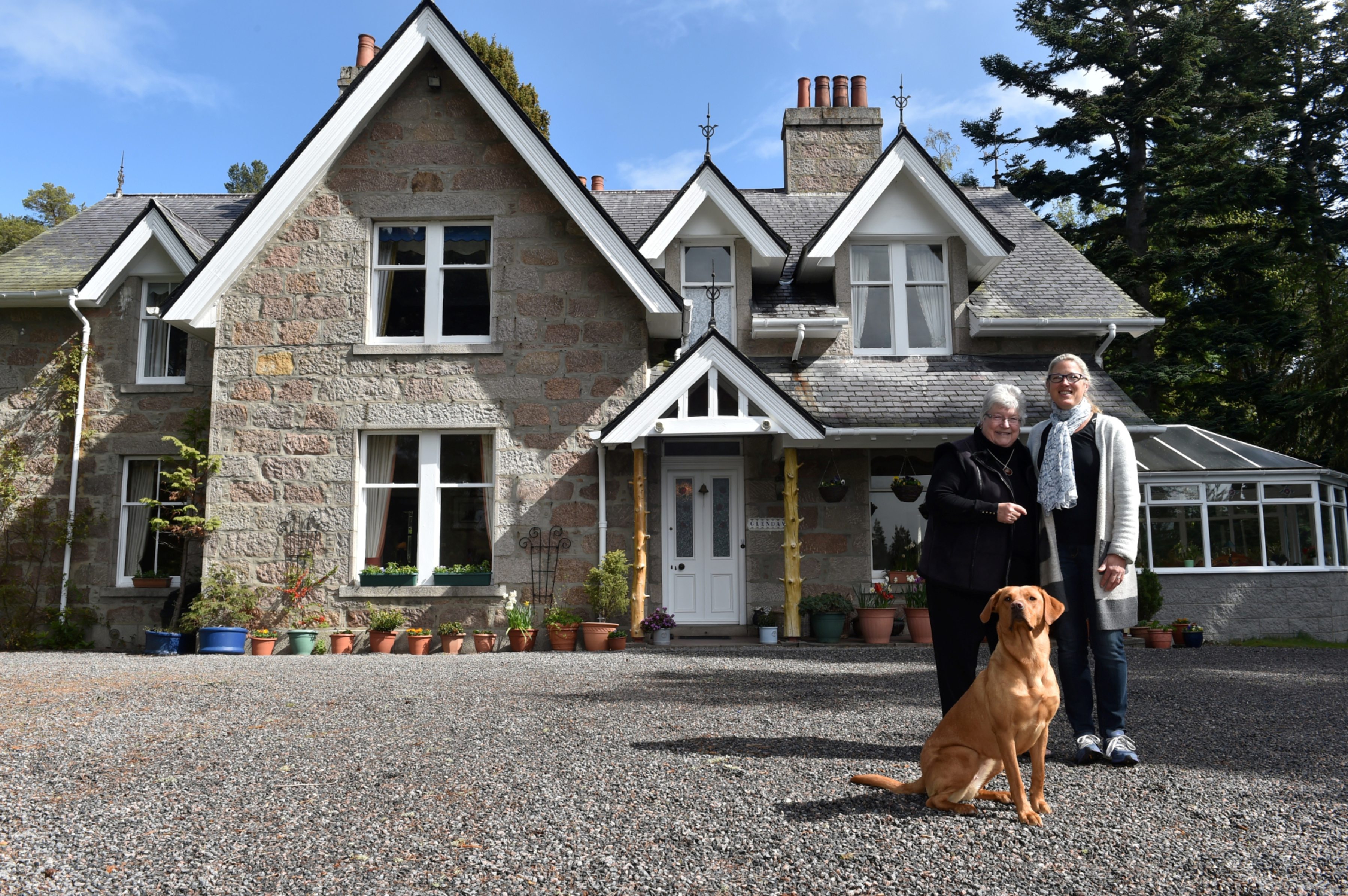Moira Milne has run Glendavan House for 40 years and is now run by daughter Rebecca, They are pictured with their dog Lex.
Picture by Colin Rennie.