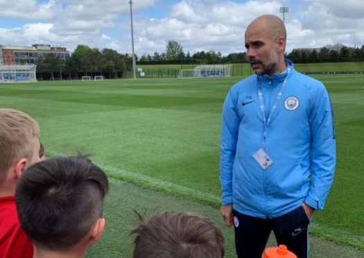 Pep Guardiola meets Aberdeen U11 side.