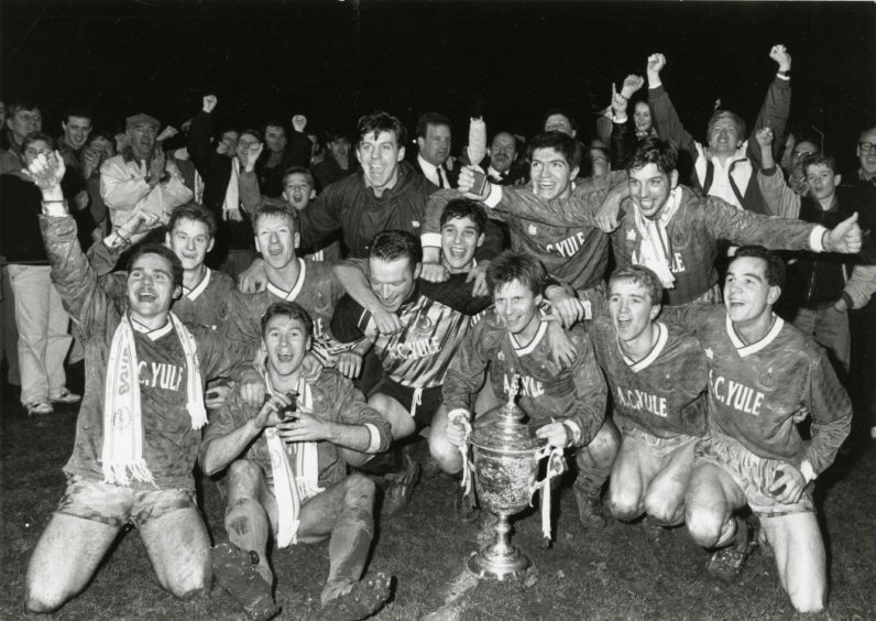 The Cove Rangers players celebrate after their Qualifying Cup triumph against Fraserburgh at Huntly in 1990.