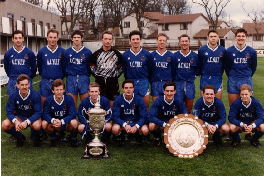 Cove Rangers show off their trophy haul so far this season - the Qualifying Cup and Evening Express Aberdeenshire and District Shield. Back row (left to right) - M. Cormack, G. Smith, S. Paterson, S. Beckett, G. Wallace, R. Yule, M. Megginson, A. Paterson, K. McKenzie. Front - B. King, R. Brown, D. Smith, D. Whyte, G. Park, D. Baxter, T. Forbes." Picture taken 22 December 1990.
