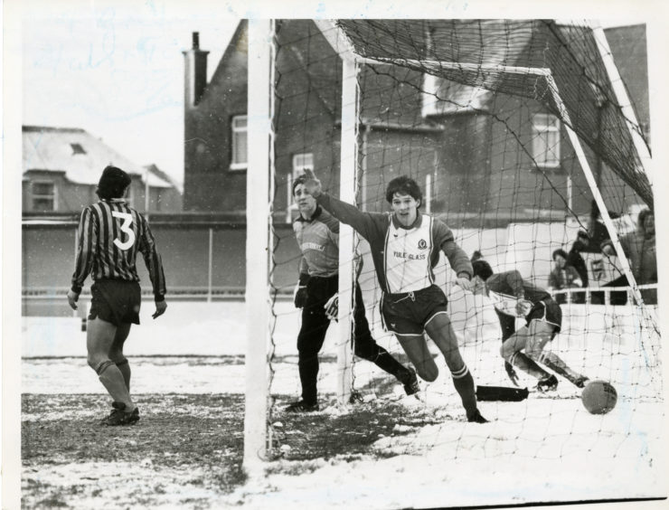 Turning on the heat at Allan Park despite the wintry conditions is Cove Rangers Gary Leiper, who left Keith keeper Thain and his defence cold when he scored the home team's first goal." Picture taken 10 January 1987.