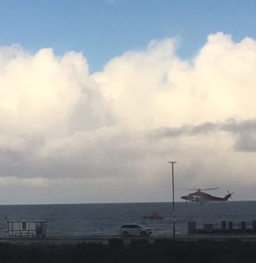 A picture of the Coastguard helicopter and RNLI lifeboat at Aberdeen beach this afternoon by Twitter user @YorkshireDeb45.