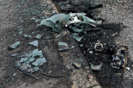 Glass from the vandalised car on Lossie Place, Mastrick.