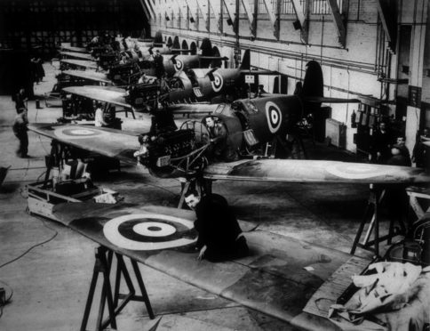 circa 1940:  The Spitfire production line at the Vickers Supermarine Works in Southampton.  (Photo by Keystone/Getty Images)