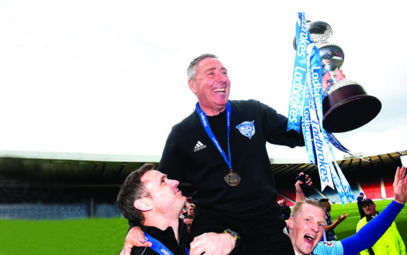 Peterhead manager Jim McInally with the League 2 title.