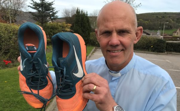 Rev Sean Swindells is taking part in an InterFaith running event.