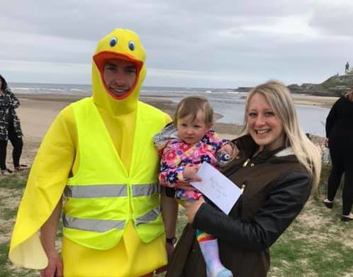 Lisa-Marie Gray with her daughter Lily and Alex Irvine dressed as Deveron Duck