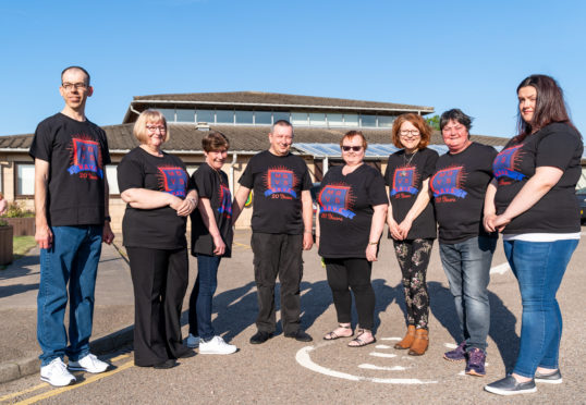 Committee members of MBVS outside the Moray Resource Centre. Pictured: Scott More, Helen Chalmers, Robina McKnockiter, Tommy Chalmers, Heather Richardson, Muriel Paton, Elizabeth Davidson and Chloe Cameron.