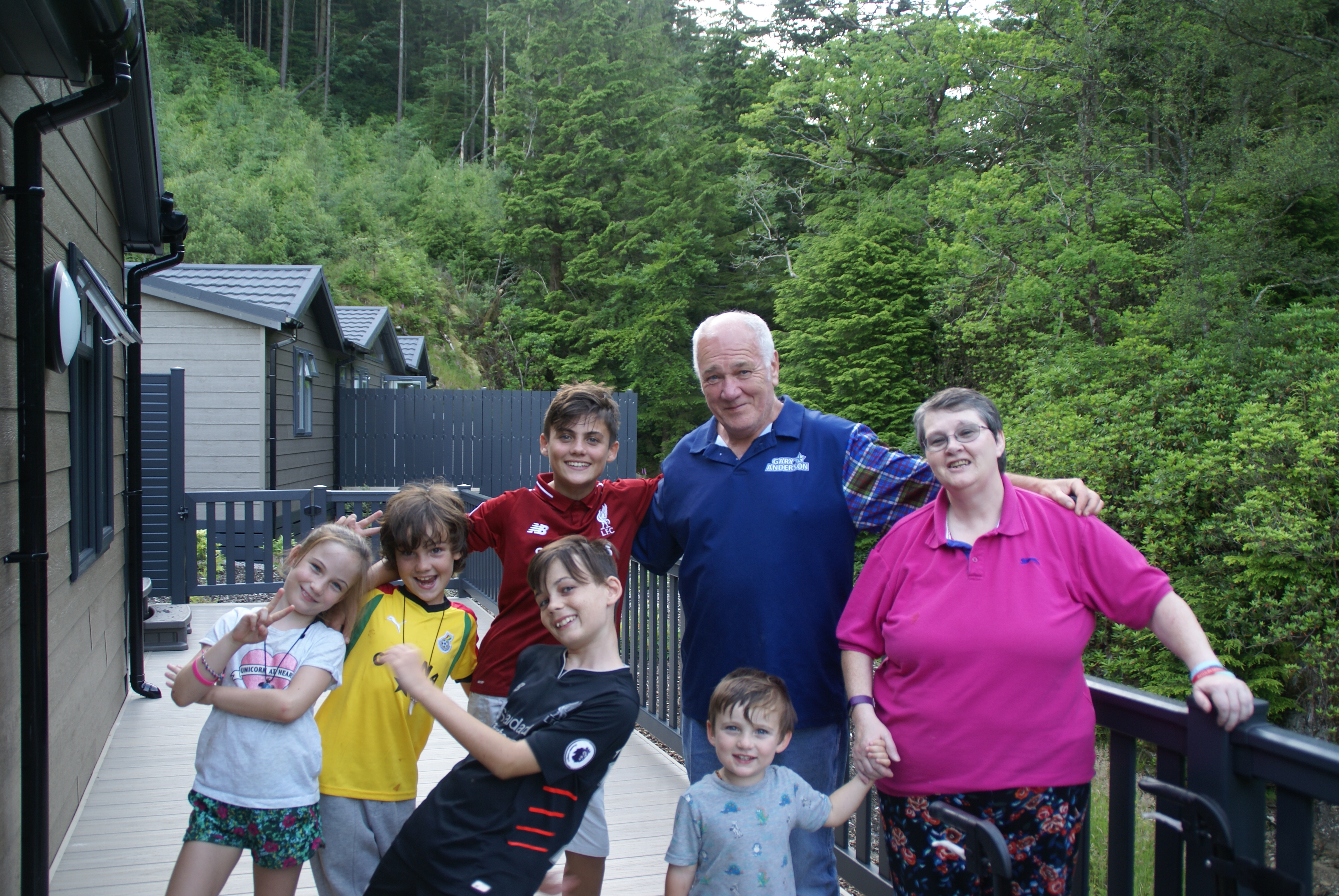 Morag and Gordon Reid and their five grandchildren
