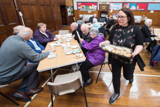 Pictured:  Lindsay Welsh (Development Officer for Moray Foodbank) waiting on tables.

Picture by Jason Hedges