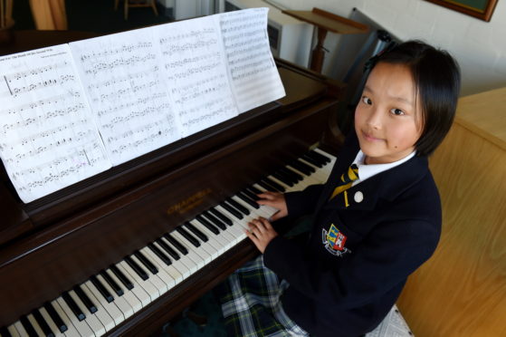 Pianist Sonia Zang, 12, was named Junior Burnsian of the Year.