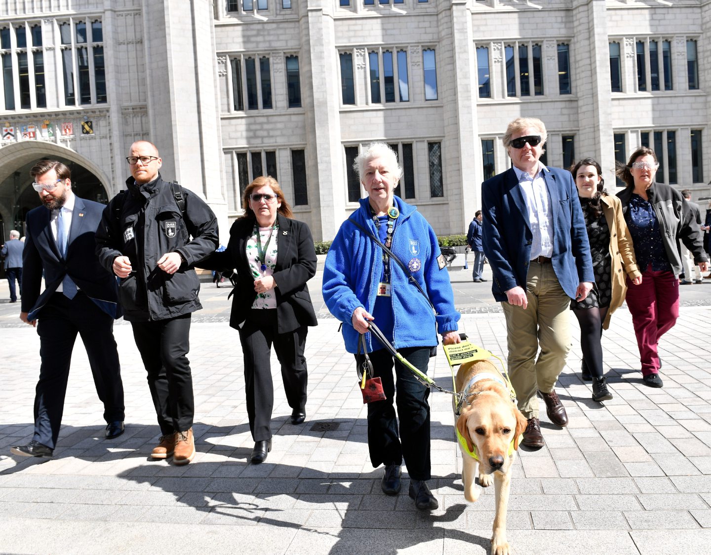 Pictured - L-R Cllr John Wheeler, Guide Niall Foles, Cllr Jackie Dunbar, Mary Rasmusen with her guide dog Vince, Cllr Ian Yuill, Guide Cate Vallis and Cllr Sandra MacDonald cross the road.    
Picture by Kami Thomson