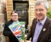 Leader of the Scottish Liberal Democrats, Willie Rennie on the campaign trail yesterday in Muir of Ord.   Also in the photograph is candidate for Ross, Skye & Lochaber Craig Harrow. Picture by Sandy McCook.
