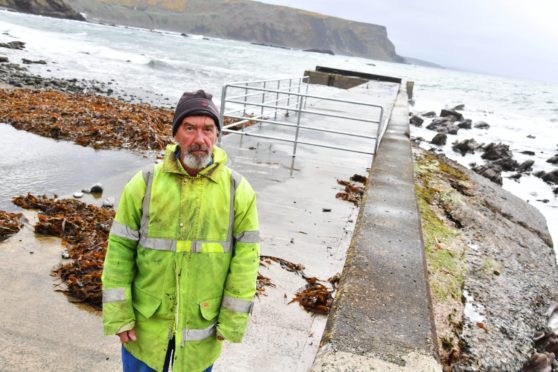 Crovie resident Bill Wiseman at the pier