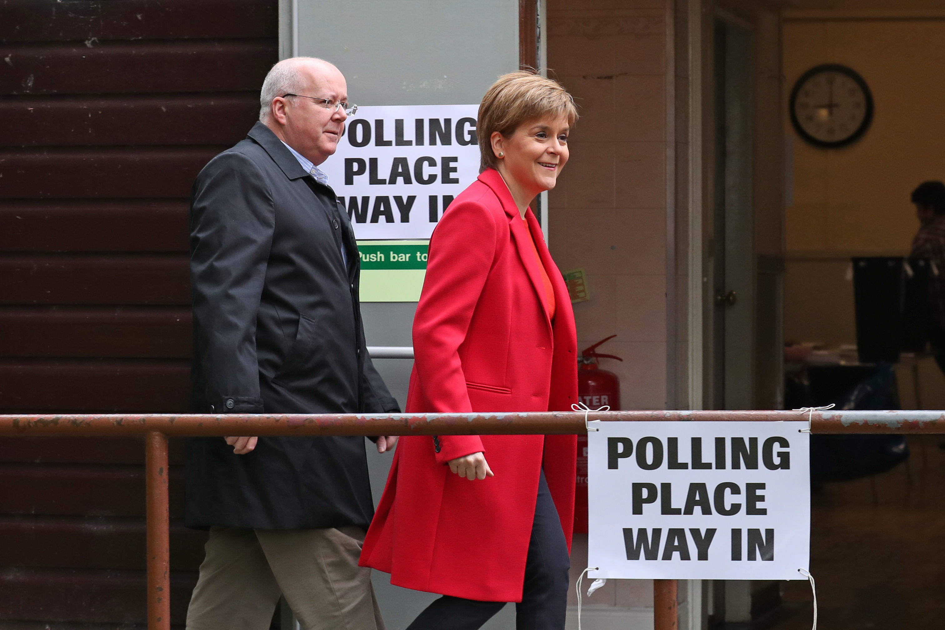 SNP leader Nicola Sturgeon and chief executive of the SNP Peter Murrell arrive at a polling station at Broomhouse Park Community Hall in Edinburgh to cast their votes for the European Parliament elections.
