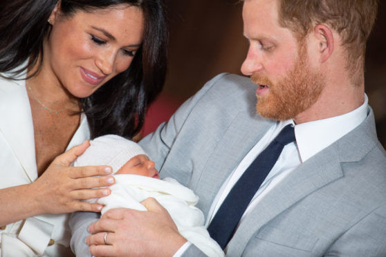 The Duke and Duchess of Sussex with their baby son, who was born on Monday morning