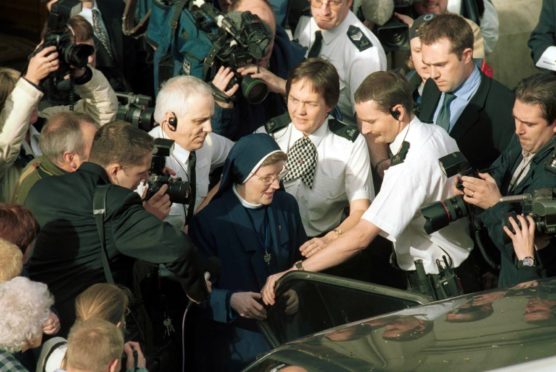 Sister Alphonso is mobbed by press as she leaves Aberdeen sheriff court