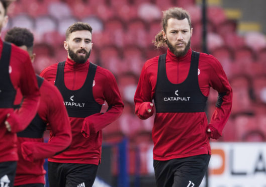 Aberdeen captain Graeme Shinnie (left) and Stevie May.