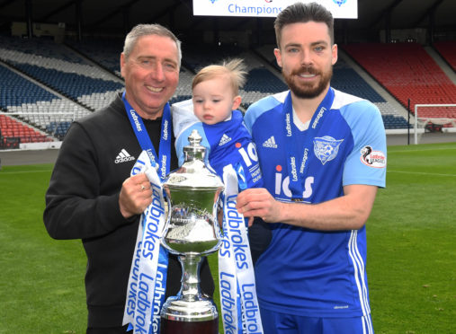 Peterhead manager Jim McInally and Ryan Dow celebrate promotion to Ladbrokes League 1.