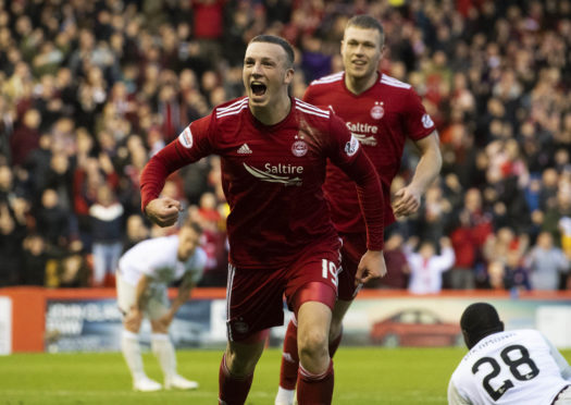 Lewis Ferguson scores for the Dons against Hearts.