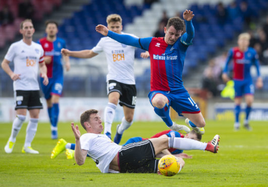 Inverness' Aaron Doran and Ayr's Aaron Muirhead in action