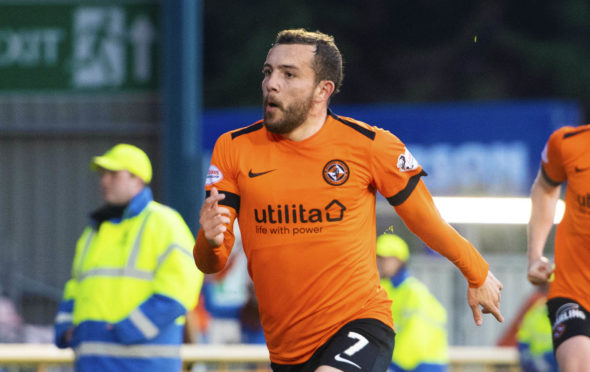 Paul McMullan wheels away in delight after making it 1-0 to Dundee United.
