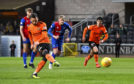 Dundee Utd's Nicky Clark makes it 1-0 from the penalty spot.