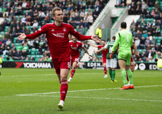 James Wilson celebrates putting Aberdeen 2-1 up.