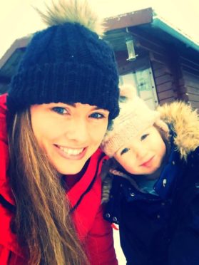 Susan Andrew with her three-year-old daughter Lois.