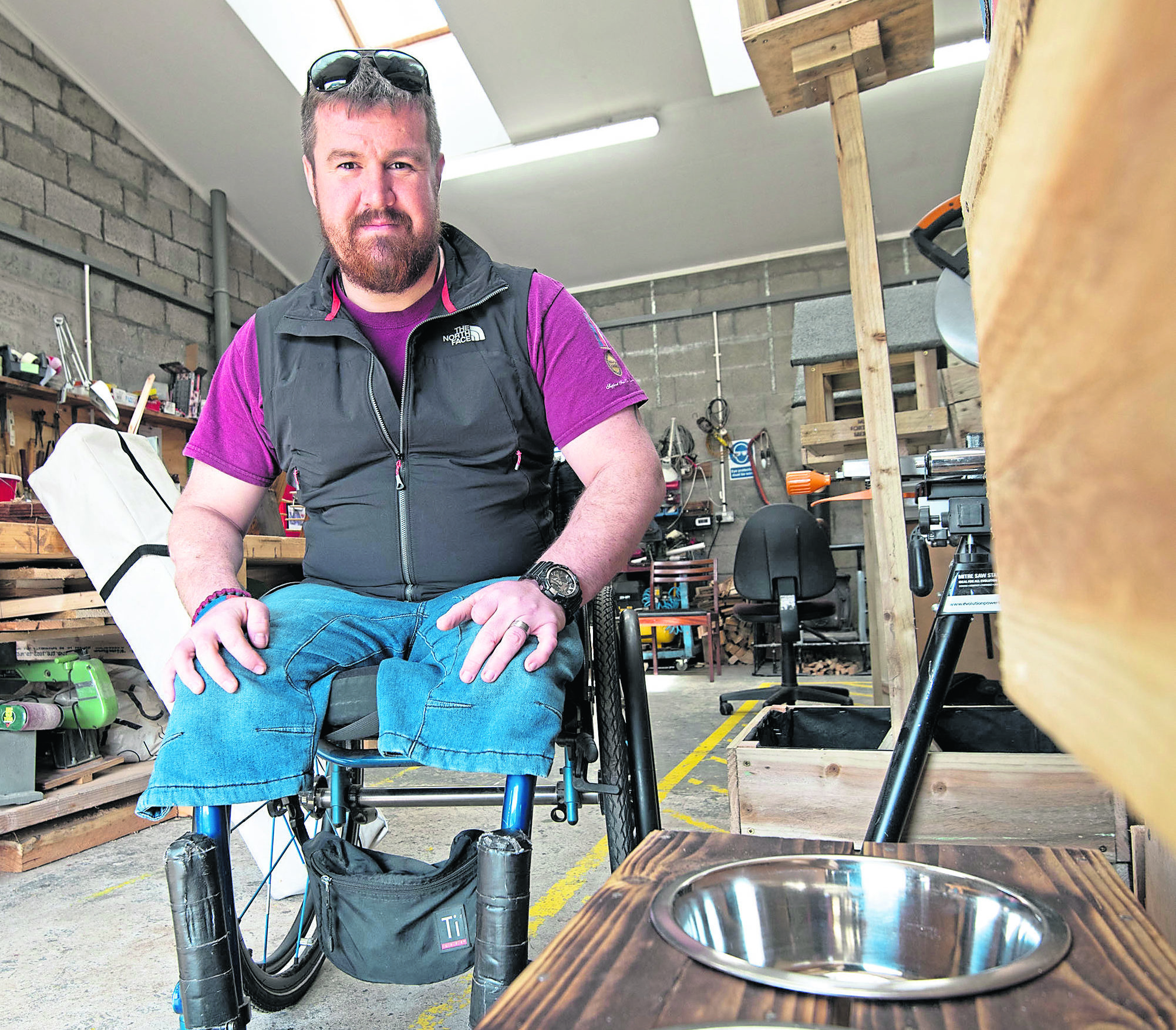 Injured Afghanistan veteran, Stuart Gallagher from Locheilside displays some of his unique, wooden products, such as dog  bowls, phone holders and Harry Potter type wizard wands at the Mens Shed open day. Picture by Iain Ferguson.