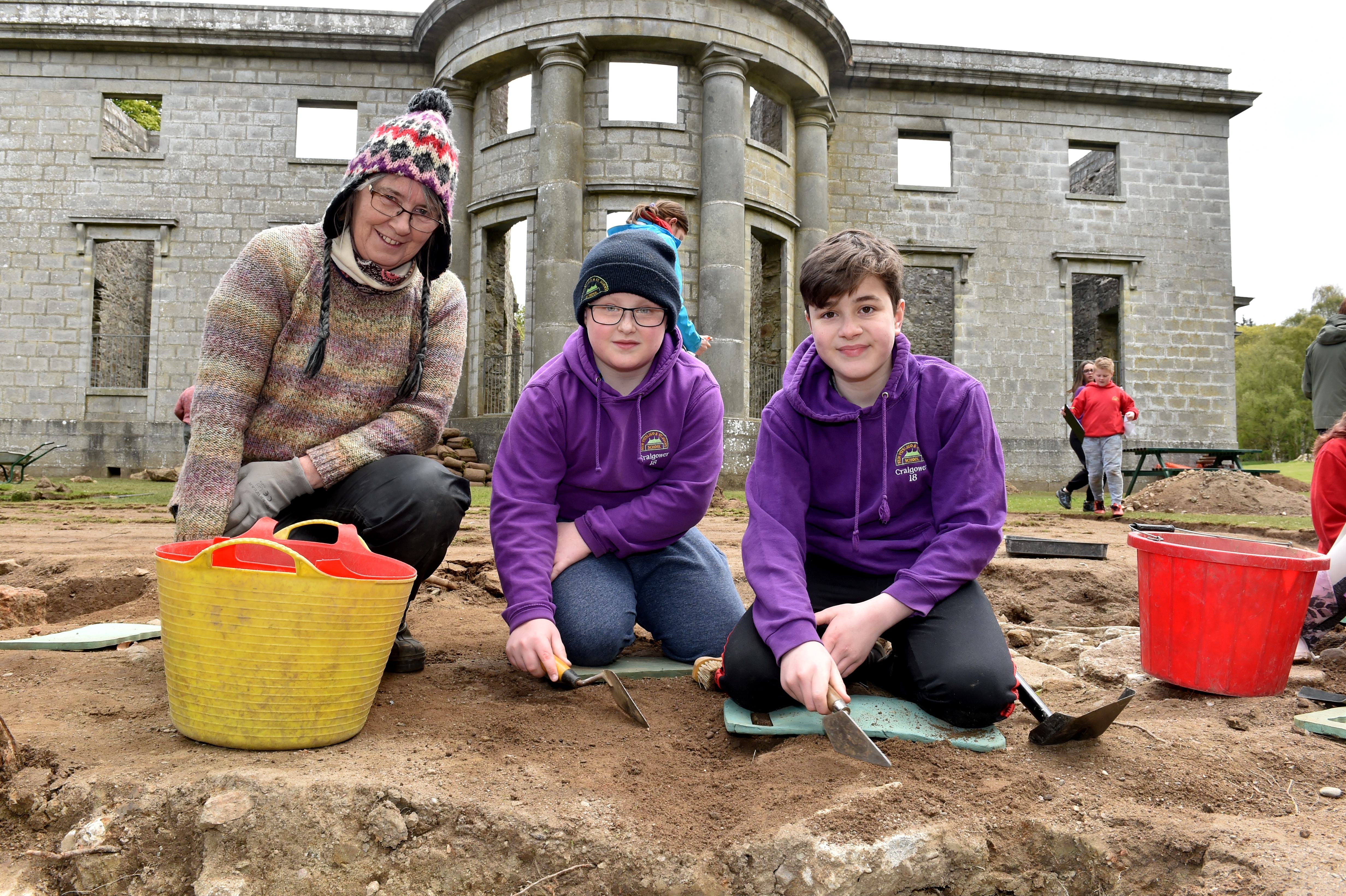 Pupils from New Pitsligo Primary helped with an archaeological dig near the Mansion House at Aden Country Park. (from left) volunteer Heather Jennings, New Pitsligo Primary pupils Ethan Alexander, 11 and Ayden Mitchell, 11. Picture by Colin Rennie.