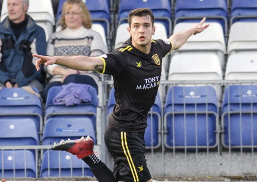 Nikolay Todorov celebrates scoring against Caley Thistle for Livingston in 2017.