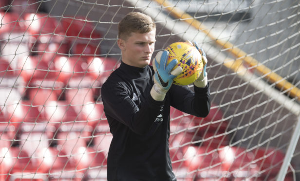 Archie Mair in action for Aberdeen.