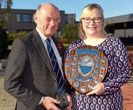 Press and Journal farming editor Gemma Mackenzie presenting an award to Graham Bruce last year.