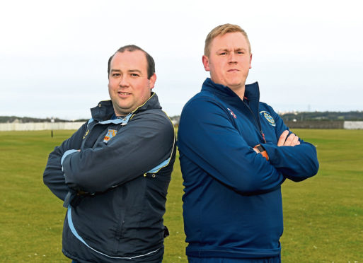 Captain's crunch: Kenny Reid from Aberdeenshire  and Jack Mitchell of Stoneywood-Dyce