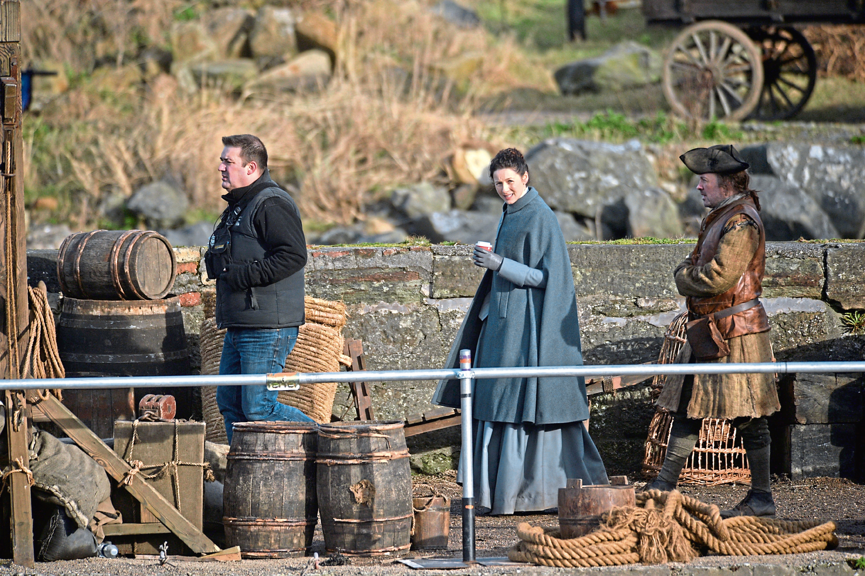 Caitriona Balfe film scenes for the popular time travel series Outlander at Dunure Harbour near Ayr.