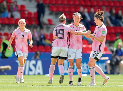 RENNES, FRANCE - JUNE 14: Lana Clelland of Scotland celebrates with teammates after scoring her team's first goal during the 2019 FIFA Women's World Cup France group D match between Japan and Scotland at Roazhon Park on June 14, 2019 in Rennes, France. (Photo by Richard Heathcote/Getty Images)