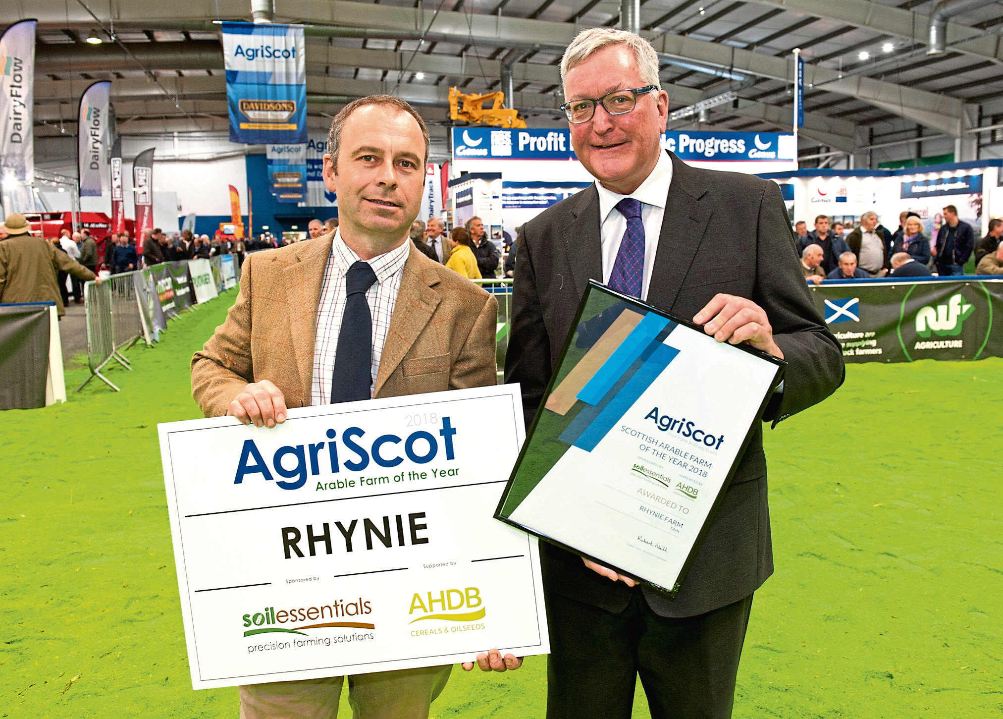Last year's winner Donald Ross receiving his award from Rural Economy Secretary Fergus Ewing.