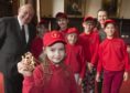 Aberdeen Lord Provost Barney Crockett with children from Gomel who visited the Town House during their time in Aberdeen last year