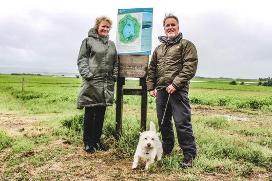 Environment minister Roseanna Cunningham with dog walker Dave Alsson.