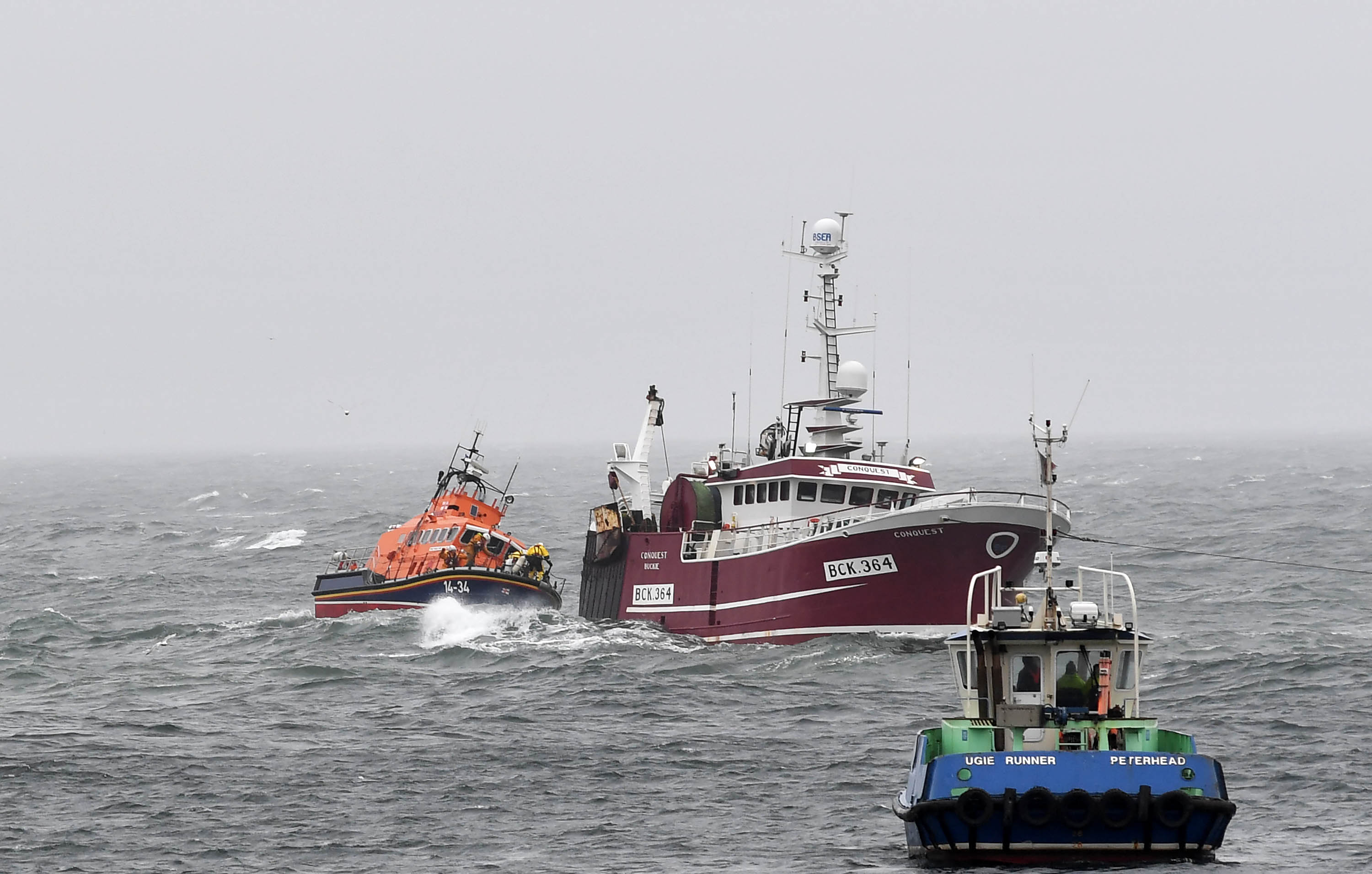 Fraserburgh lifeboat escorts Buckie-registered Conquest into Peterhead harbour