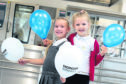 The new extension has been opened at Dalneigh Primary School. The cutting of the ribbon was done by the school's two youngest pupils, Paige Higham (5) and Charlotte Dingwall (6). Picture by Andrew Smith