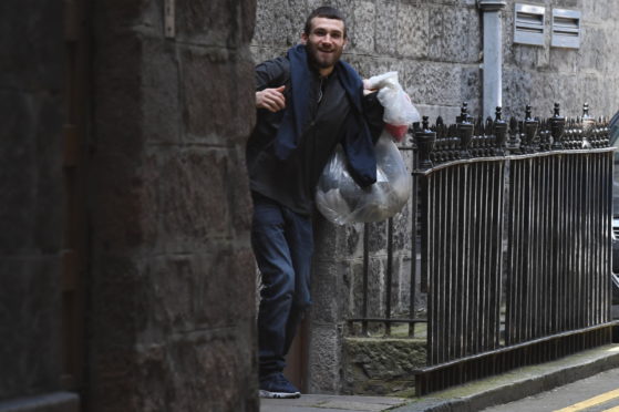 George Cowie leaving Aberdeen Sheriff Court